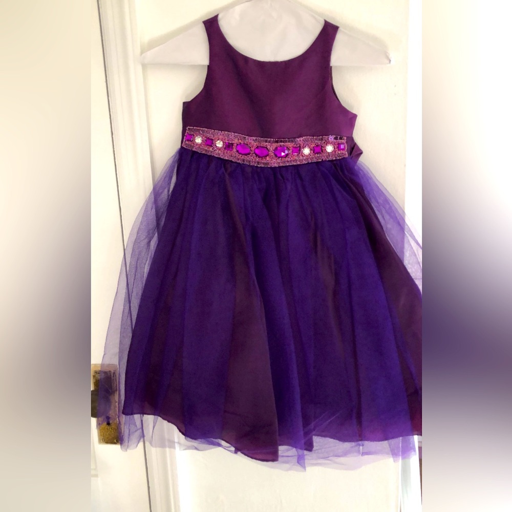 Purple flower girl dress. Gorgeous beading details around waist. Size 4.